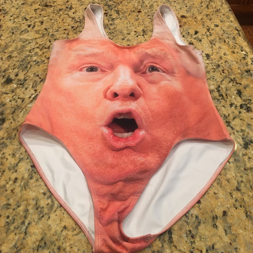 Medium one piece Donald Trump swimsuit used but good condition